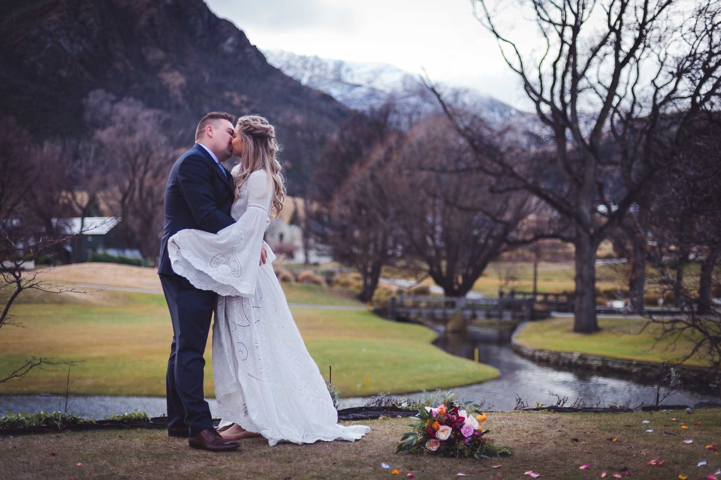 Millbrook resort winter wedding secret garden ceremony bride groom kiss