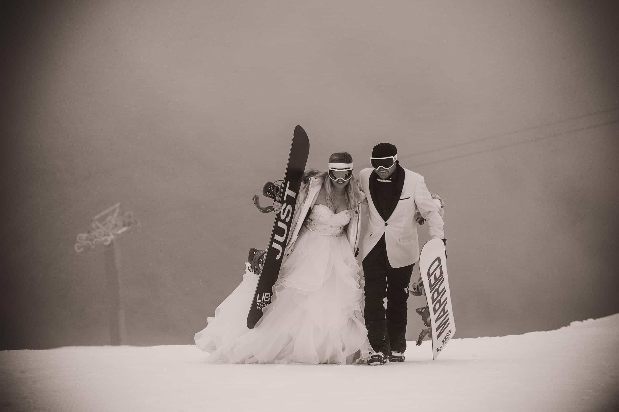 queenstown wedding trends Now this is what I call a Queenstown Winter Wedding!! At Coronet Peak...on snowboards...in a snow storm!! fallon photography