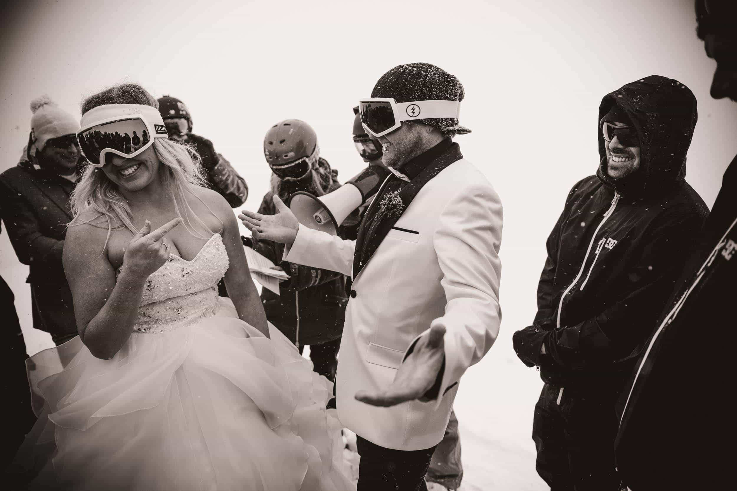 Now this is what I call a Queenstown Winter Wedding!!  At Coronet Peak...on snowboards...in a snow storm!! fallon photography