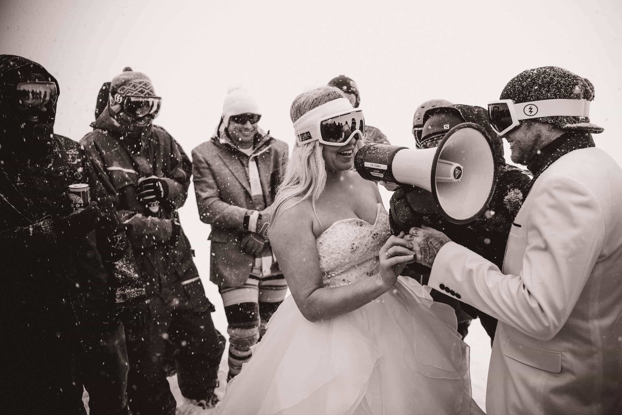 Now this is what I call a Queenstown Winter Wedding!!  At Coronet Peak...on snowboards...in a snow storm!! fallon photography