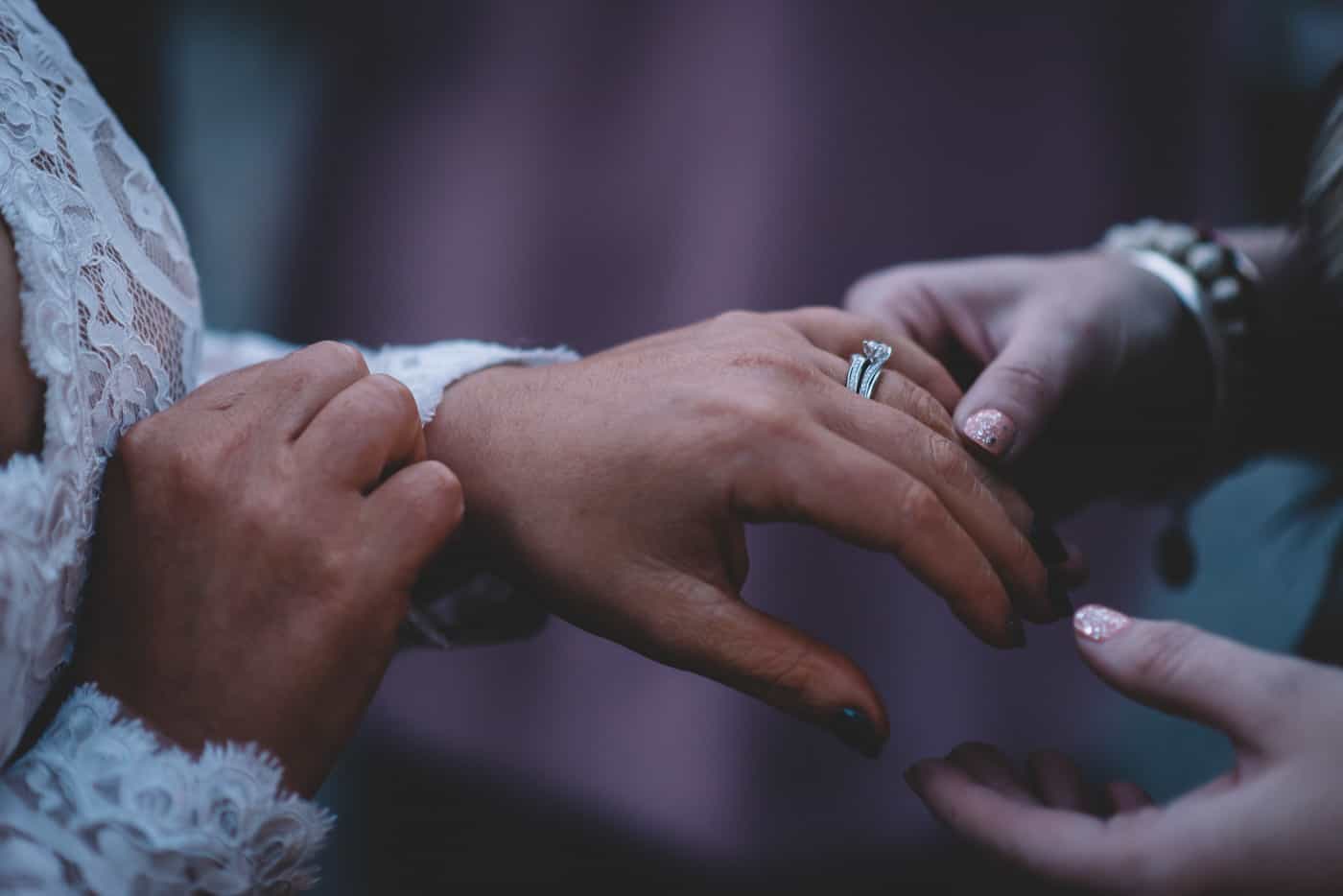 Sam and Kirk's elopement wedding reception at Akarua Wines and kitchen by artisan showing off the ring